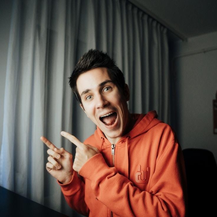 Avery Lin, Lead Design Curator at Swift Mirror Path, reviewing corporate floral arrangements